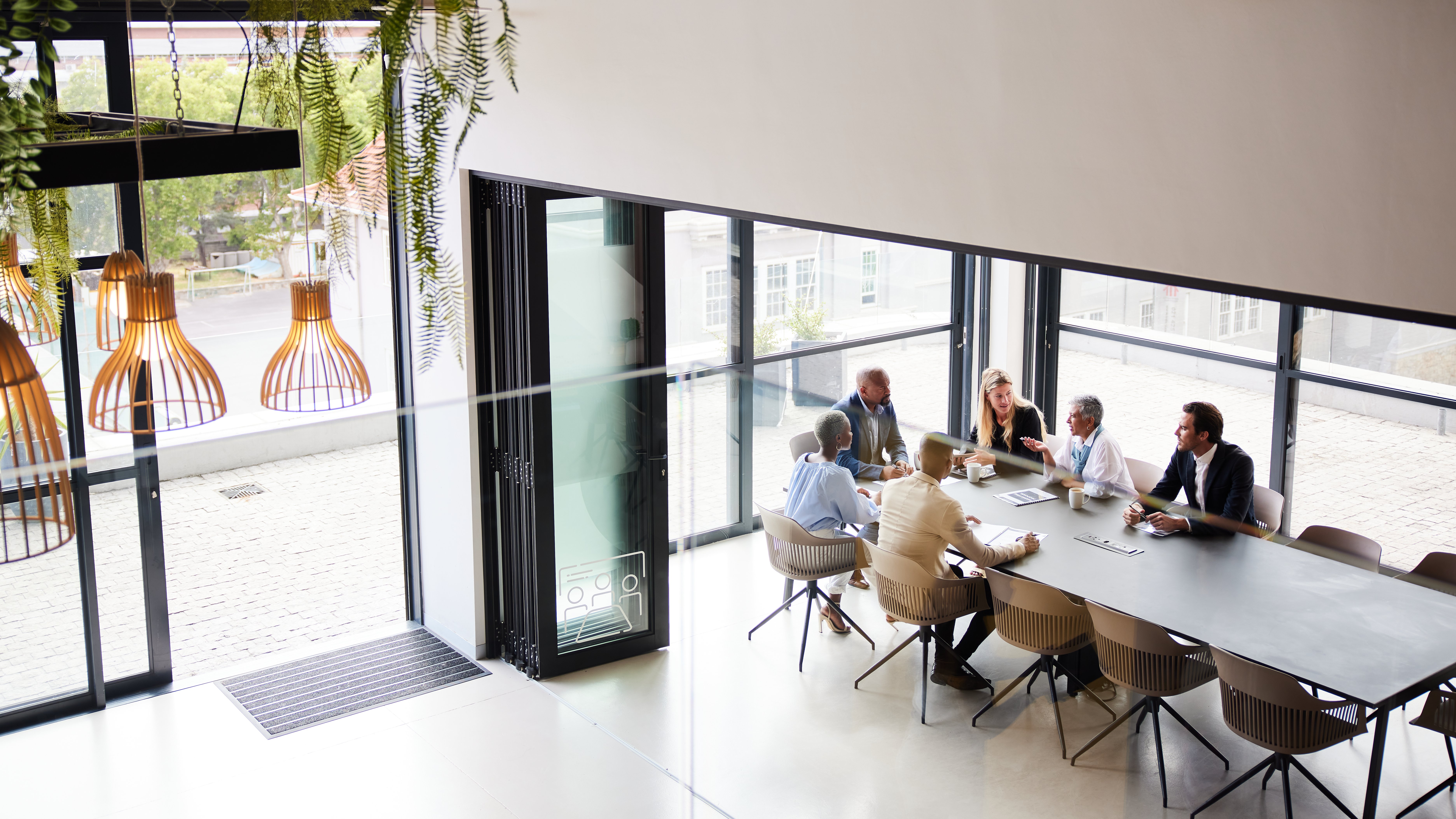 Thriving_Diverse-people-meeting-modern-bright-office