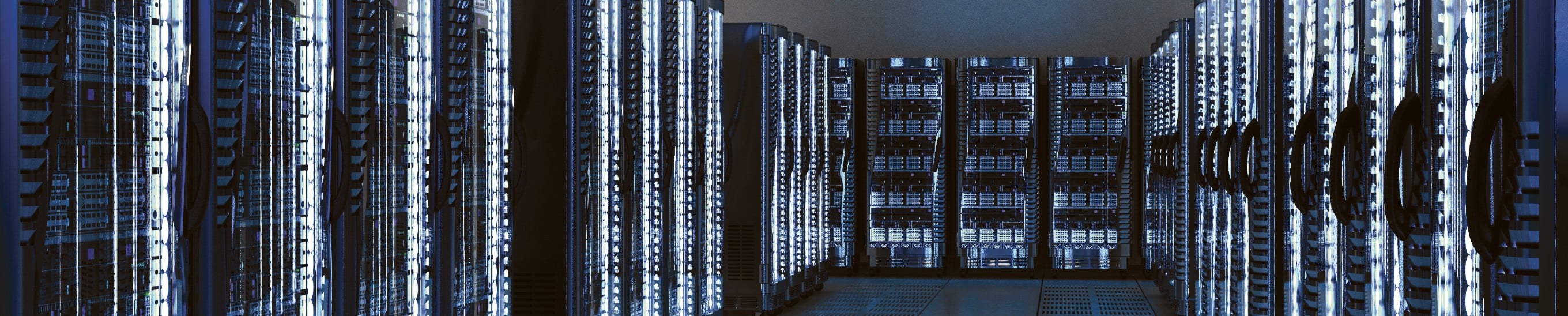 Rows of illuminated server racks in a modern data center, representing mid-market core-plus infrastructure opportunities discussed in CBRE Investment Management's open-end funds webcast replay.