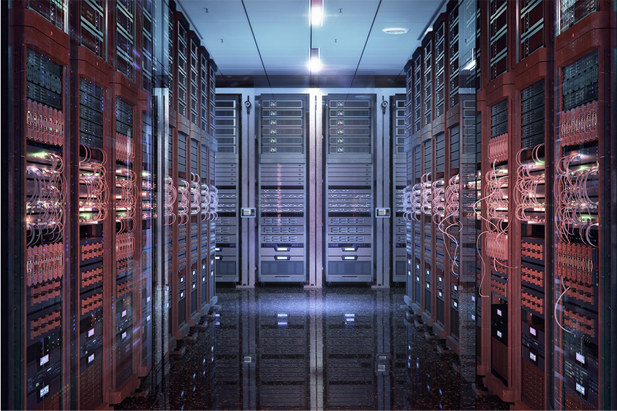 A brightly lit data center with rows of server racks and cables.