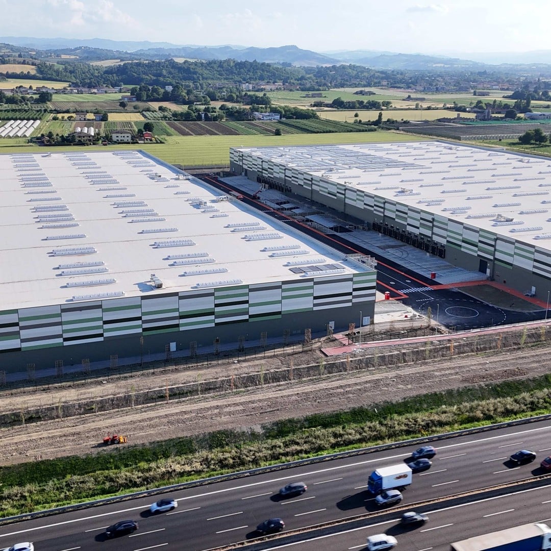 Aerial view of CBRE Investment Management's newly acquired Grade A logistics warehouse complex in Italy, situated along a major motorway corridor