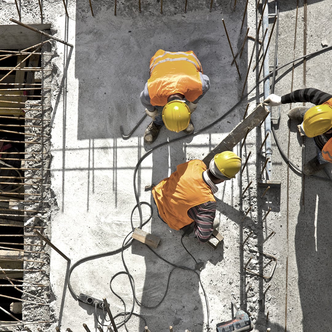 A group of construction workers working on a construction site