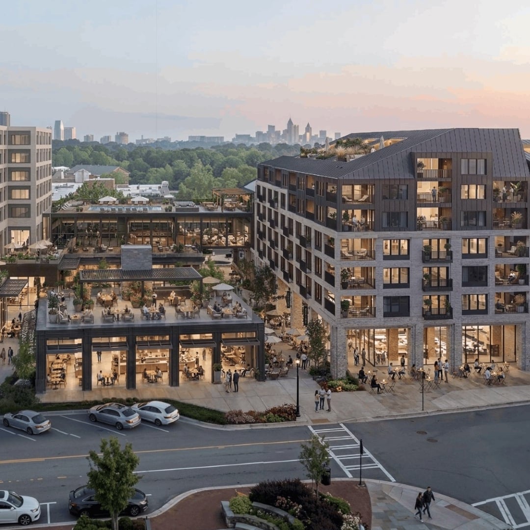 Exterior frontage of a hotel and mixed-use development showcasing the commercial property's street-facing architecture.
