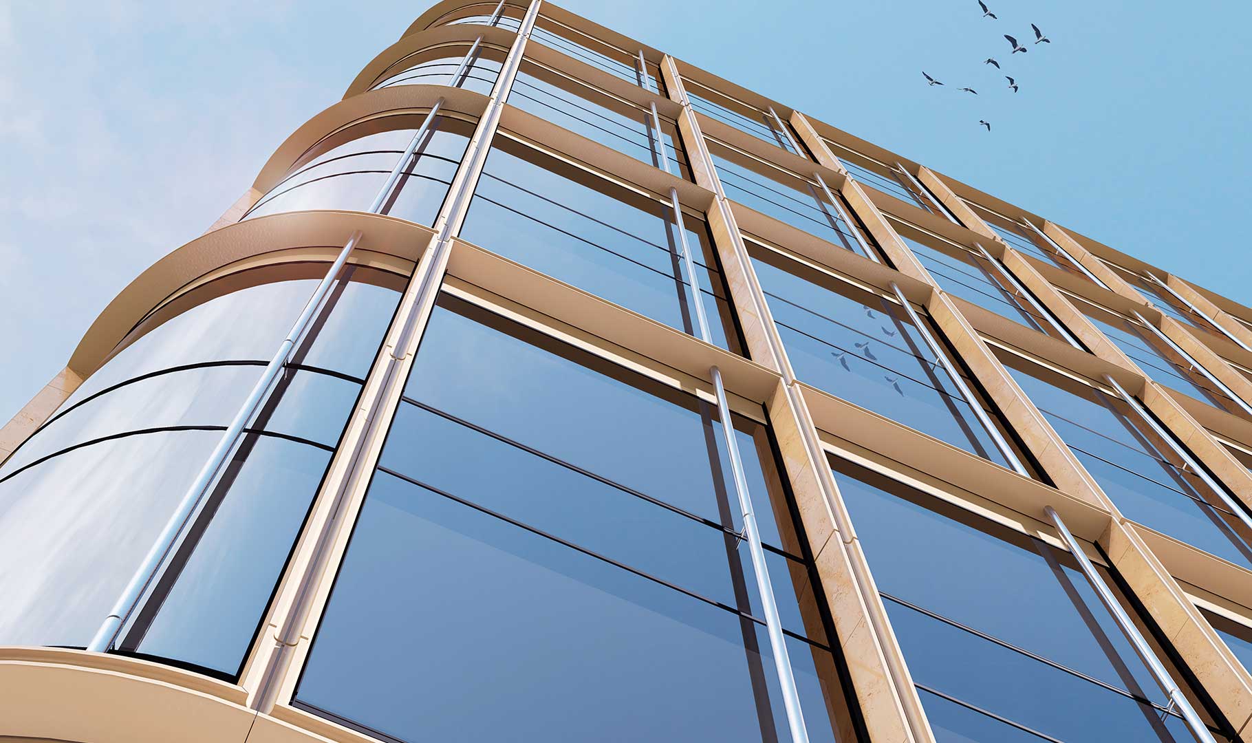Low‑angle view of a modern glass office building with curved architecture, reflective windows, and clear blue sky, showcasing contemporary urban design.