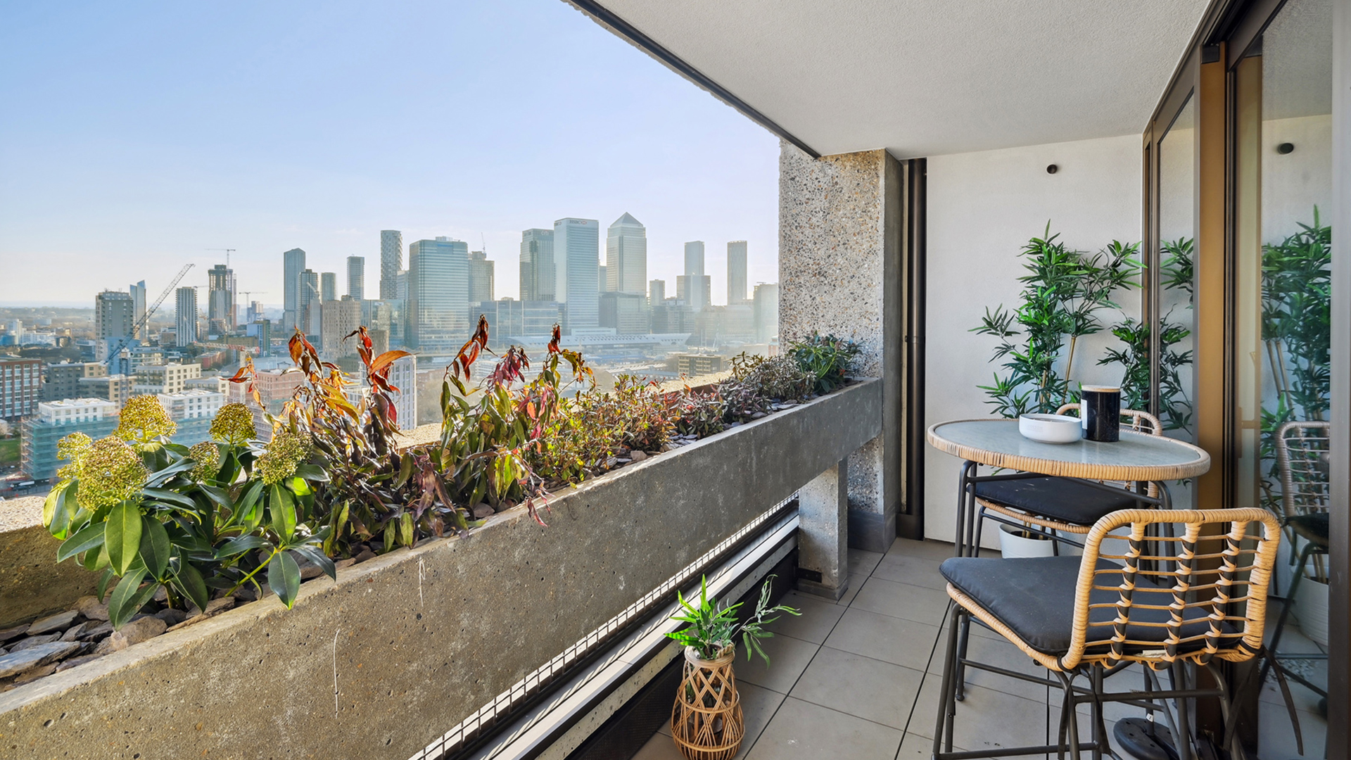 Photograph of patio with city view.
