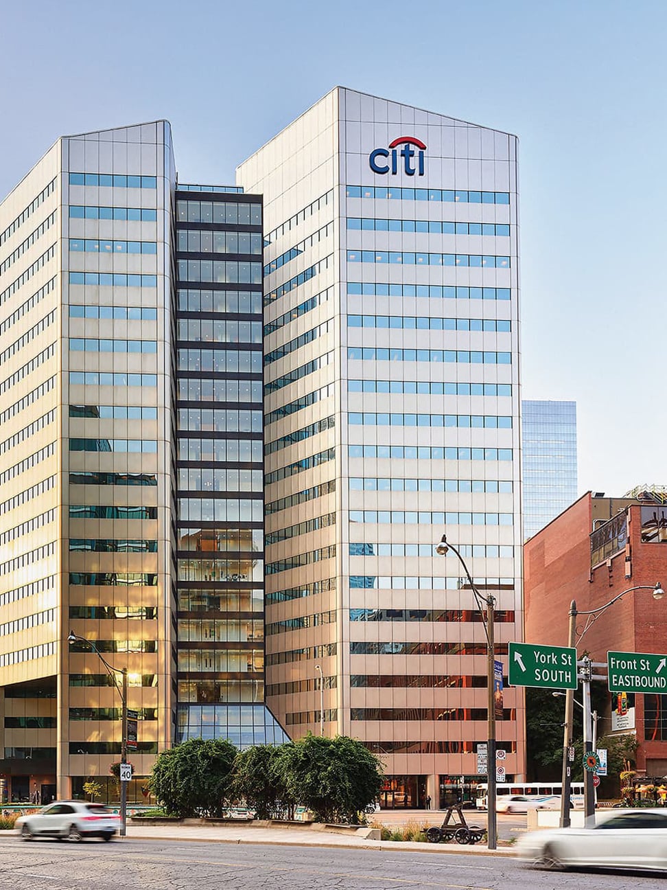 Citigroup Place, a modern glass office tower with the Citi logo at the top, at the intersection of York Street and Front Street.