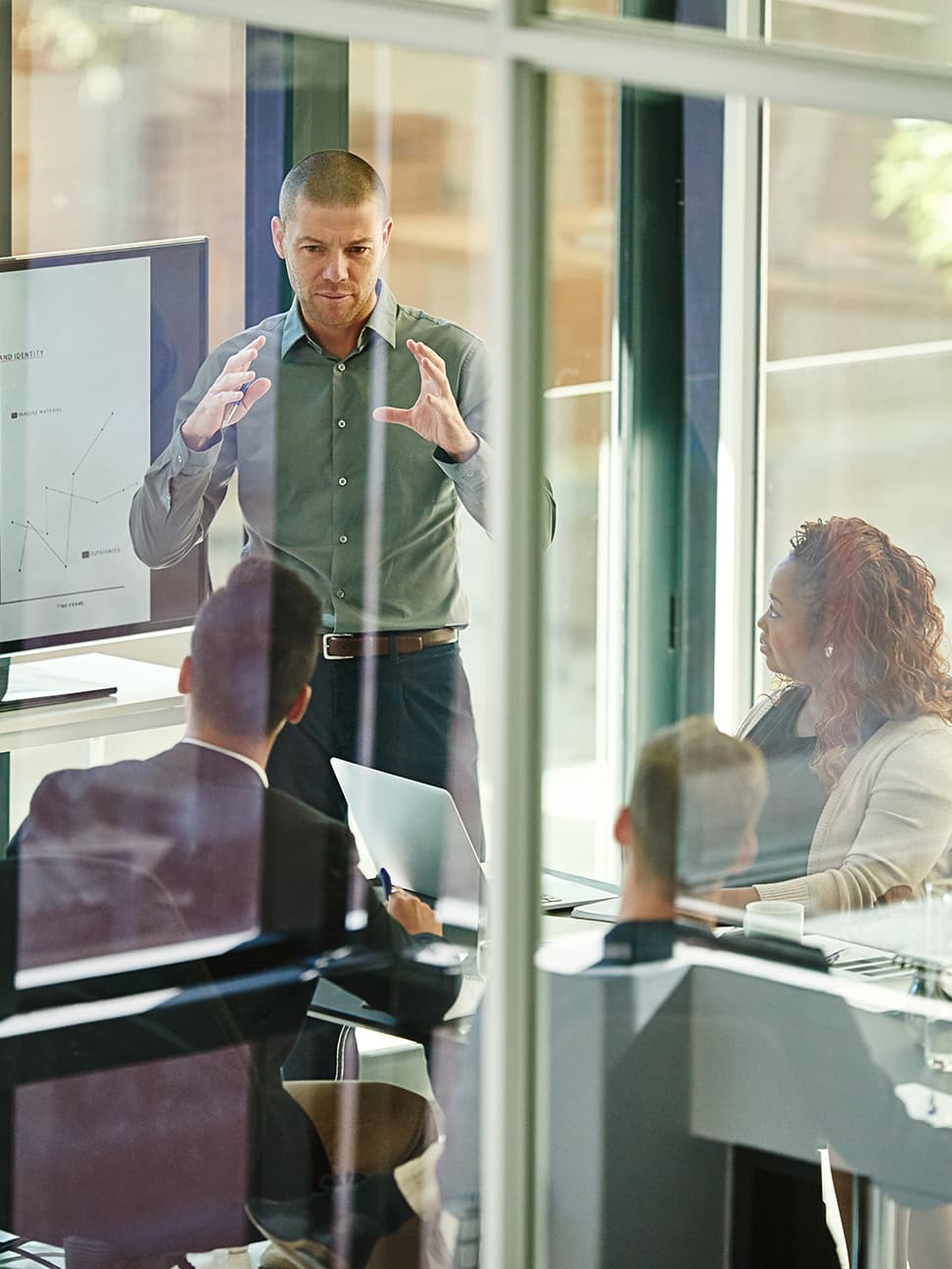 Man presenting the Tech Talent report