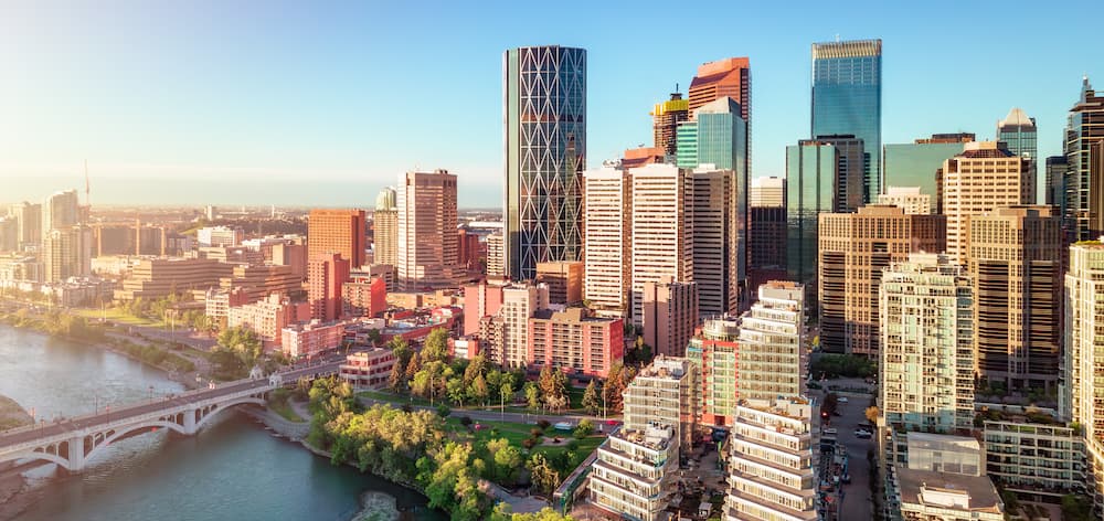 Downtown Calgary skyline with Bow River and modern office towers.
