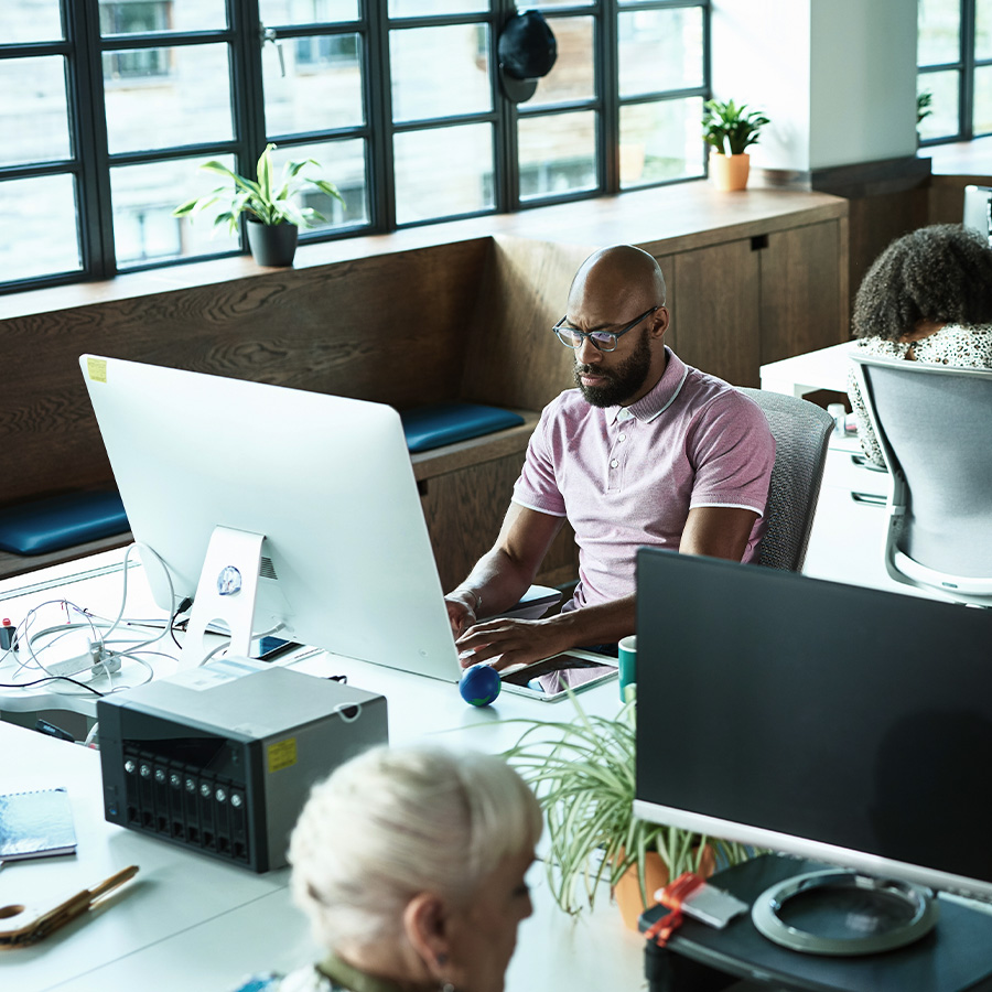 professional using a workstation in a corporate office