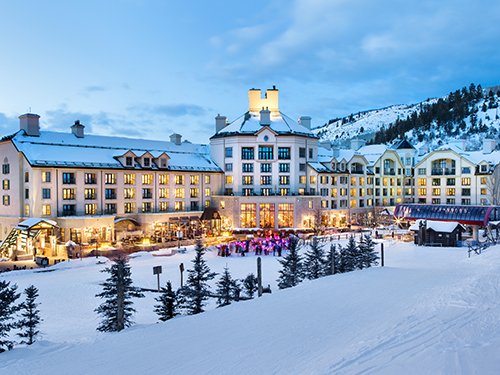 Winter evening exterior of the Park Hyatt Beaver Creek Resort and Spa in Avon, Colorado, a 130-key luxury ski resort sold by CBRE