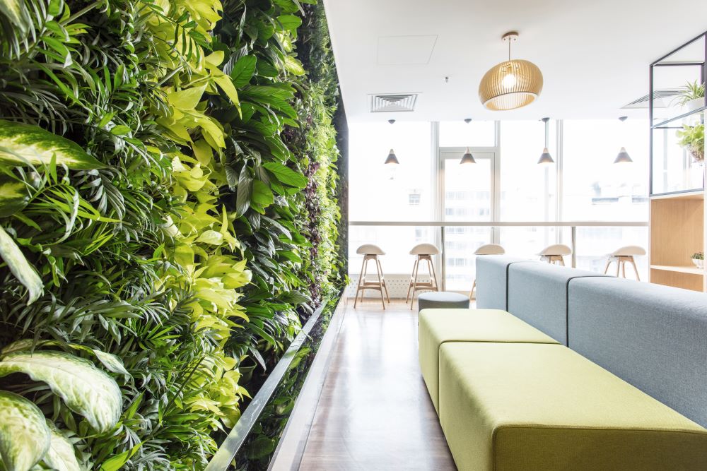 How are occupiers aligning their real estate portfolio with corporate sustainability goals