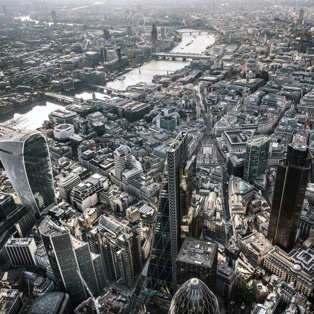 Aerial view of skyscrapers in London's financial district along the River Thames