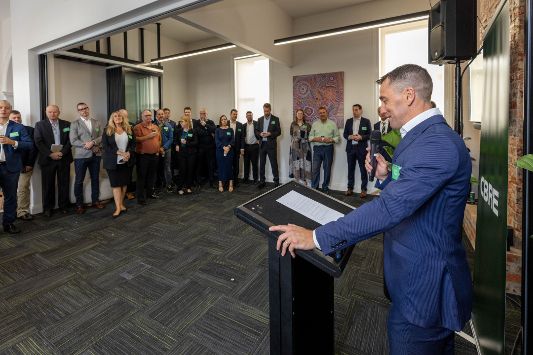 Jarrod Frazer delivers a speech at the opening of CBRE's Geelong office.