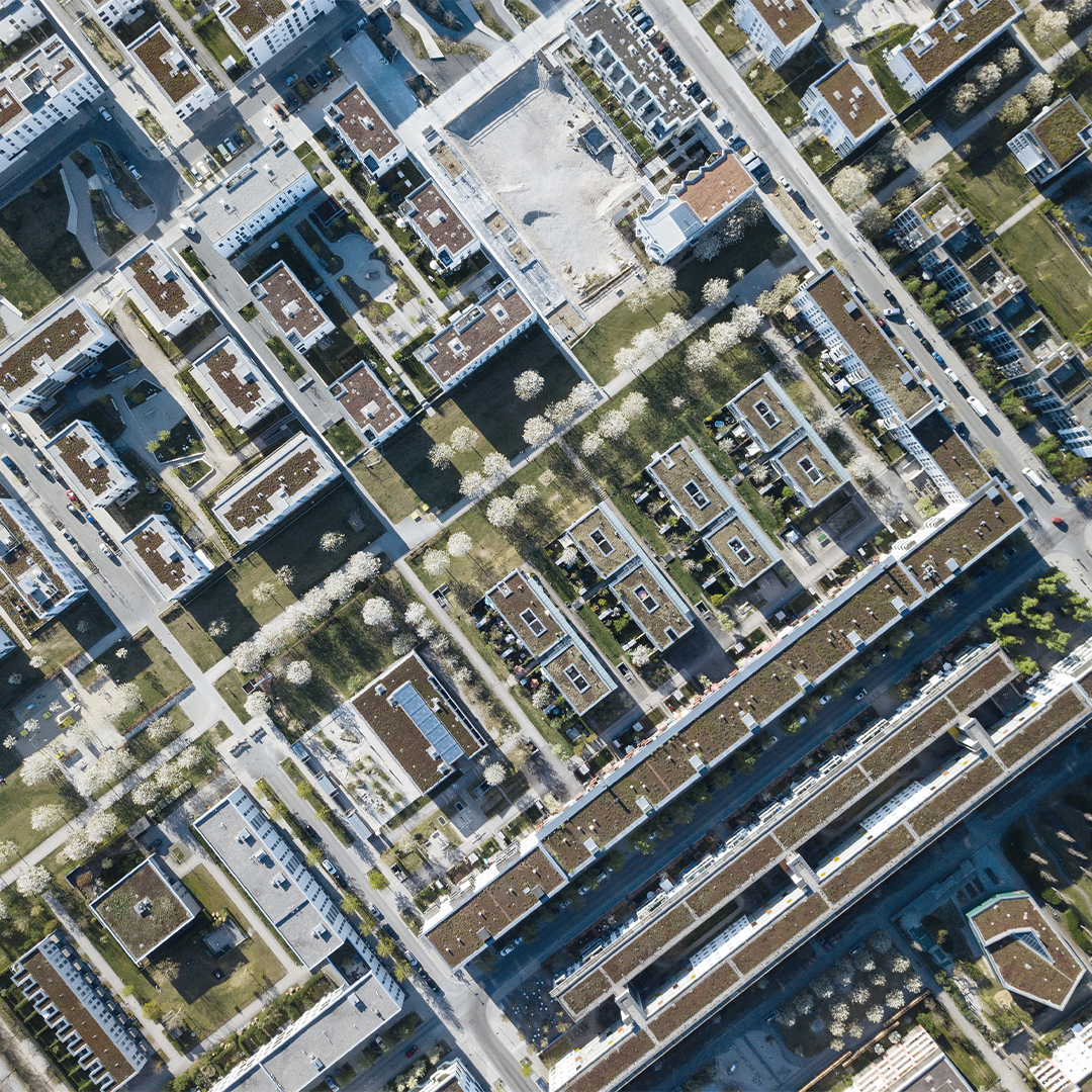 Aerial view of a commercial real estate development with multiple buildings and roads.