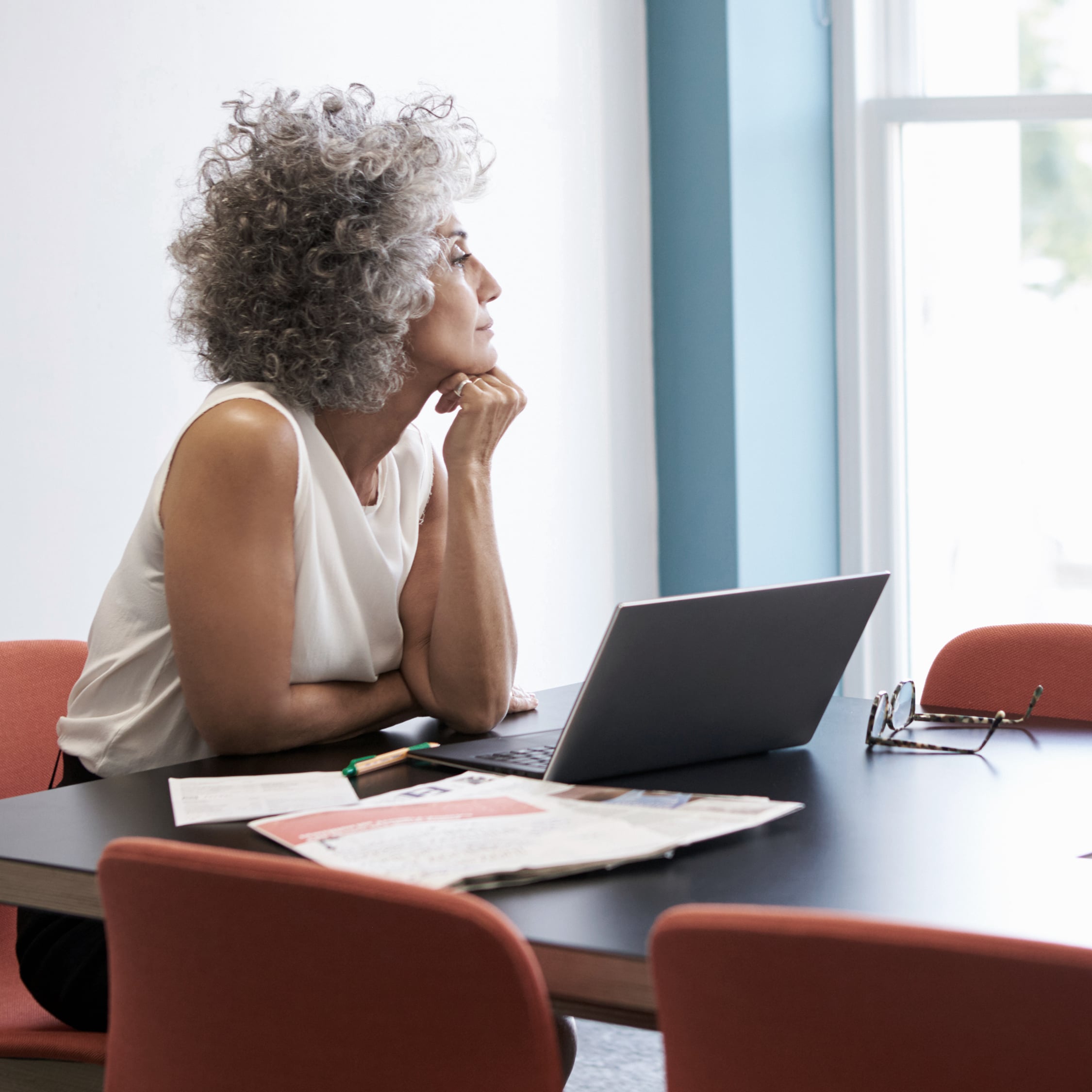 Person looking out a window.
