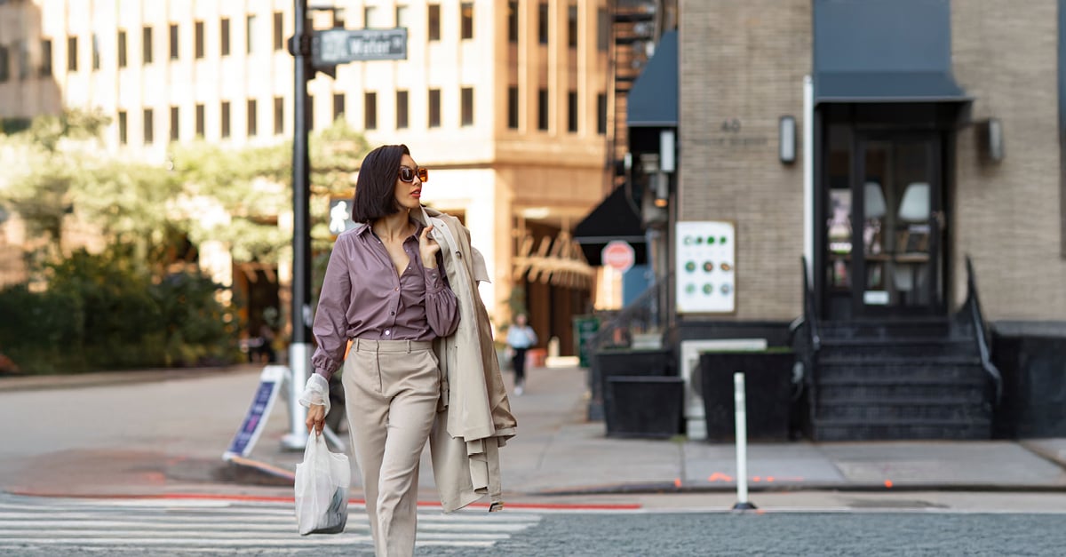 professional-walking-through-urban-street-crosswalk-modern-cityscape-social