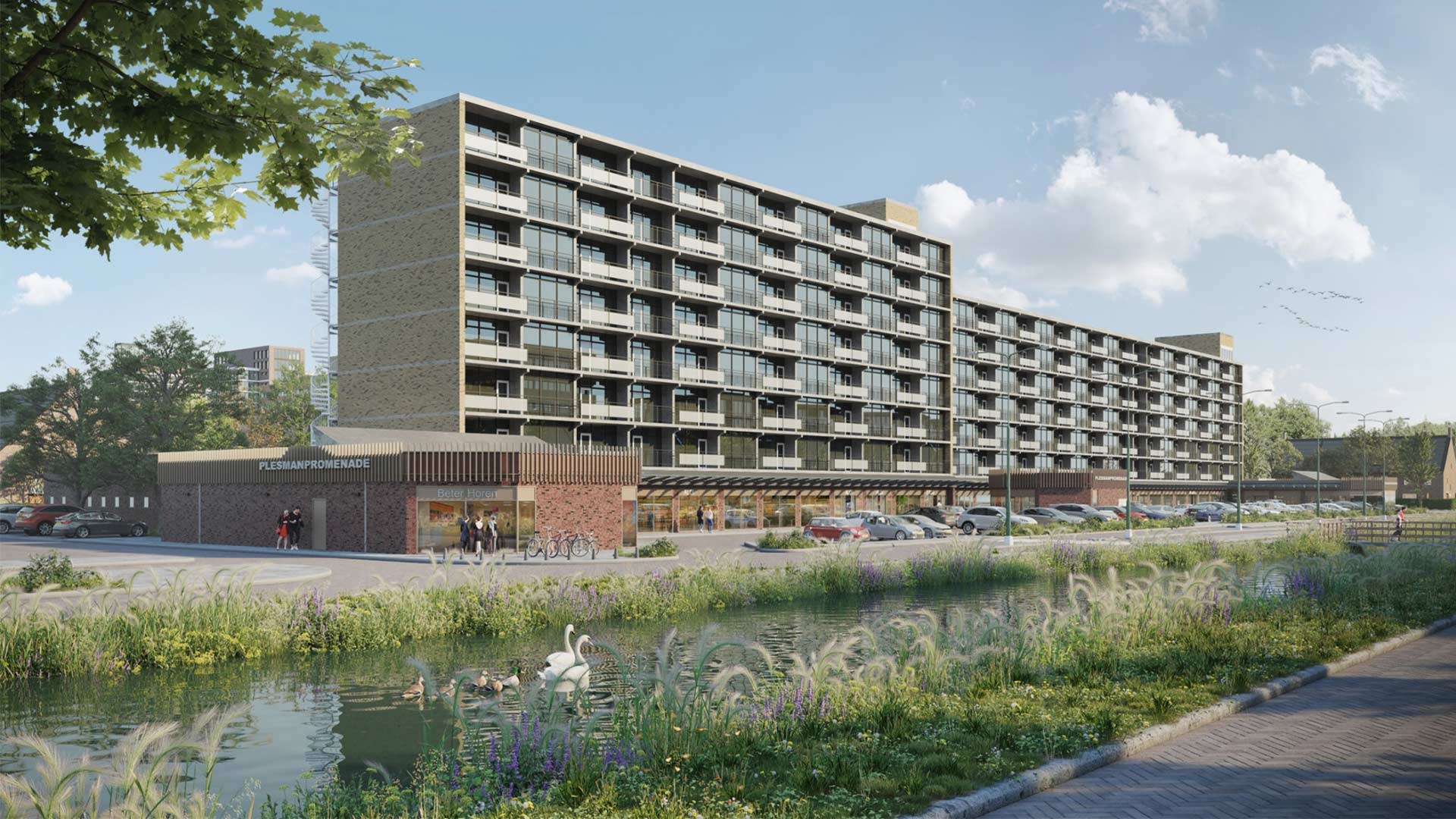 Een modern, multifunctioneel gebouw met appartementen en winkels, omgeven door groen met een vijver en wandelpaden in de voorgrond.