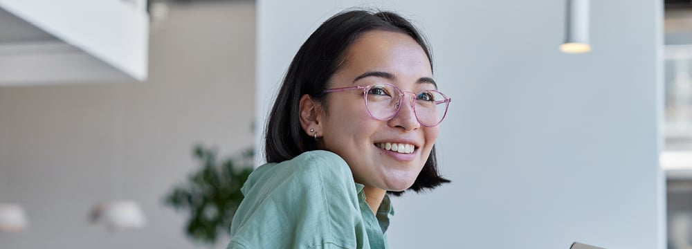 Smiling businesswoman in a modern office setting