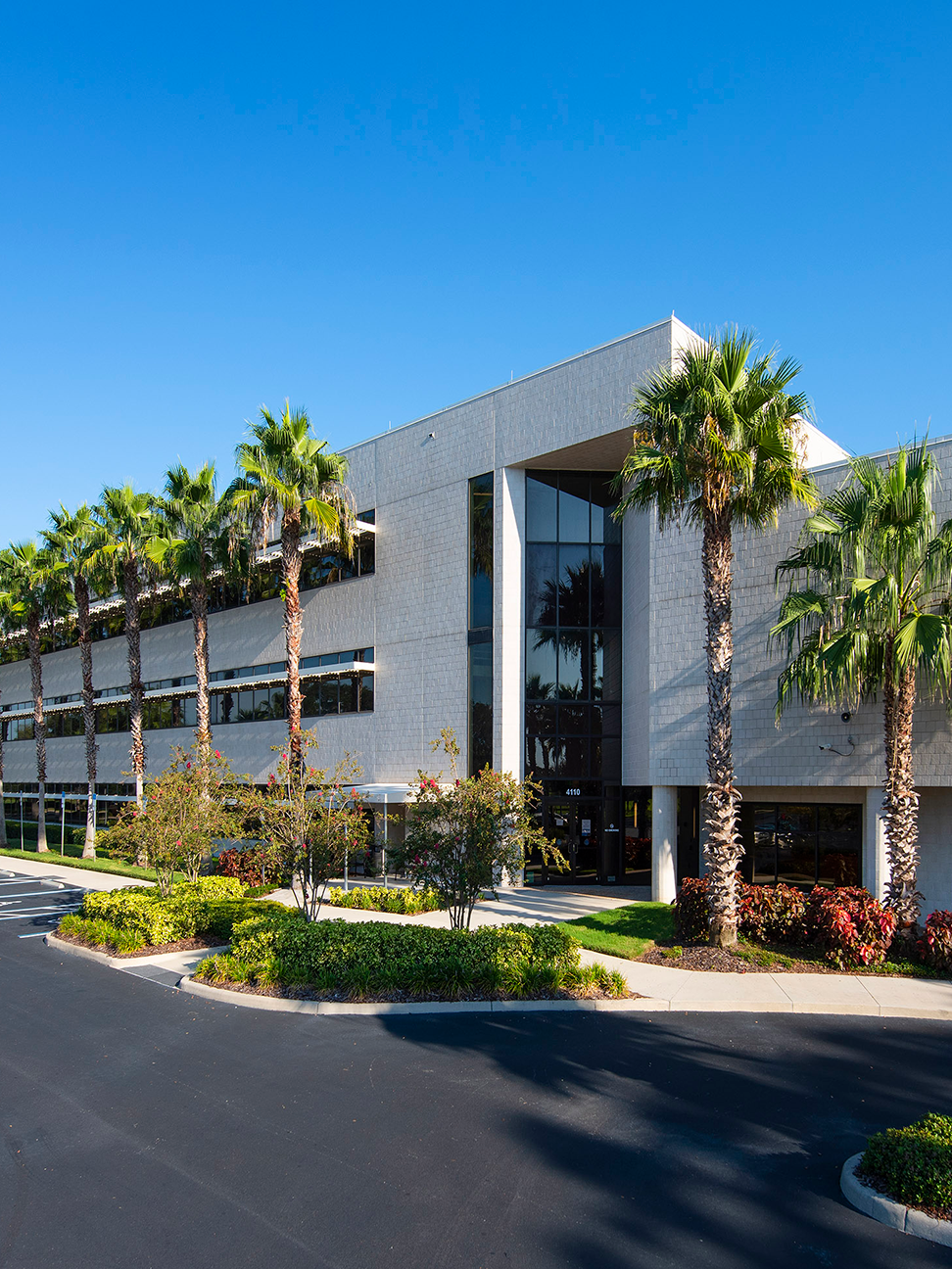 Exterior of the entrance of the two-story office property located at 4110 George Road in Tampa, Florida