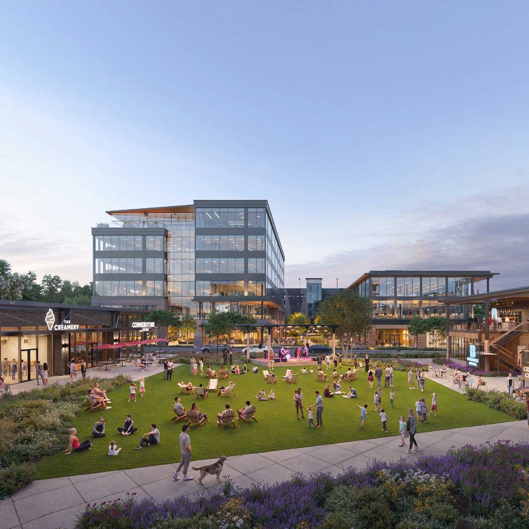 Rendering of the exterior of the Alston Yards mixed-use development that showcases glass buildings, storefronts, and green space with people and animals.