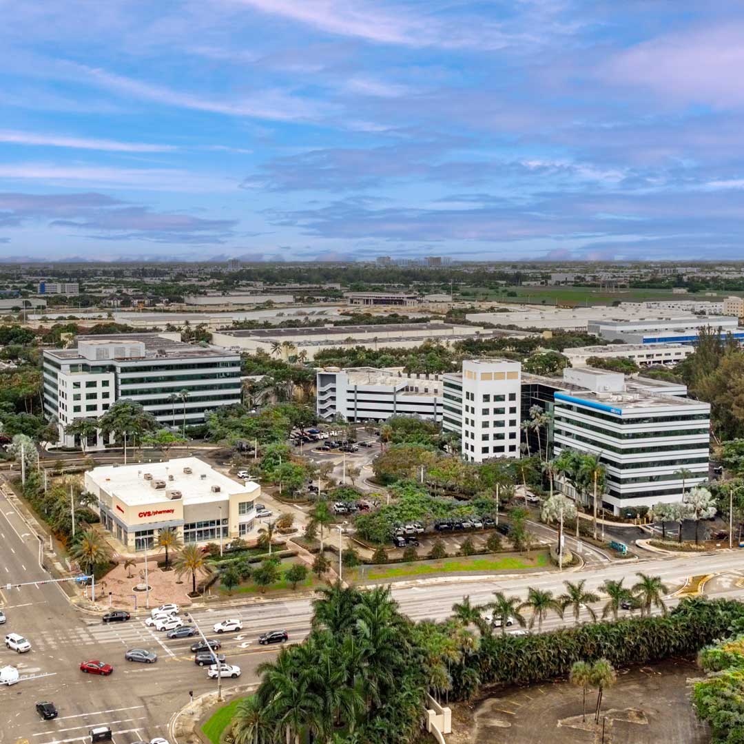Aerial view of two-tower office complex in Doral, Florida