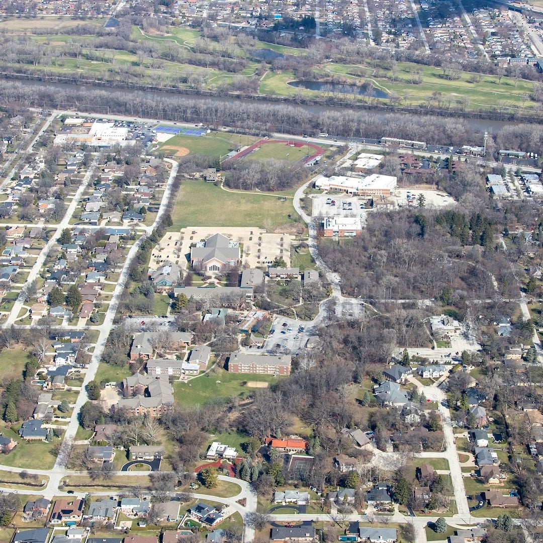 Aerial view of Trinity Christian College's 60-acre campus surrounded by a suburban Chicago residential neighborhood
