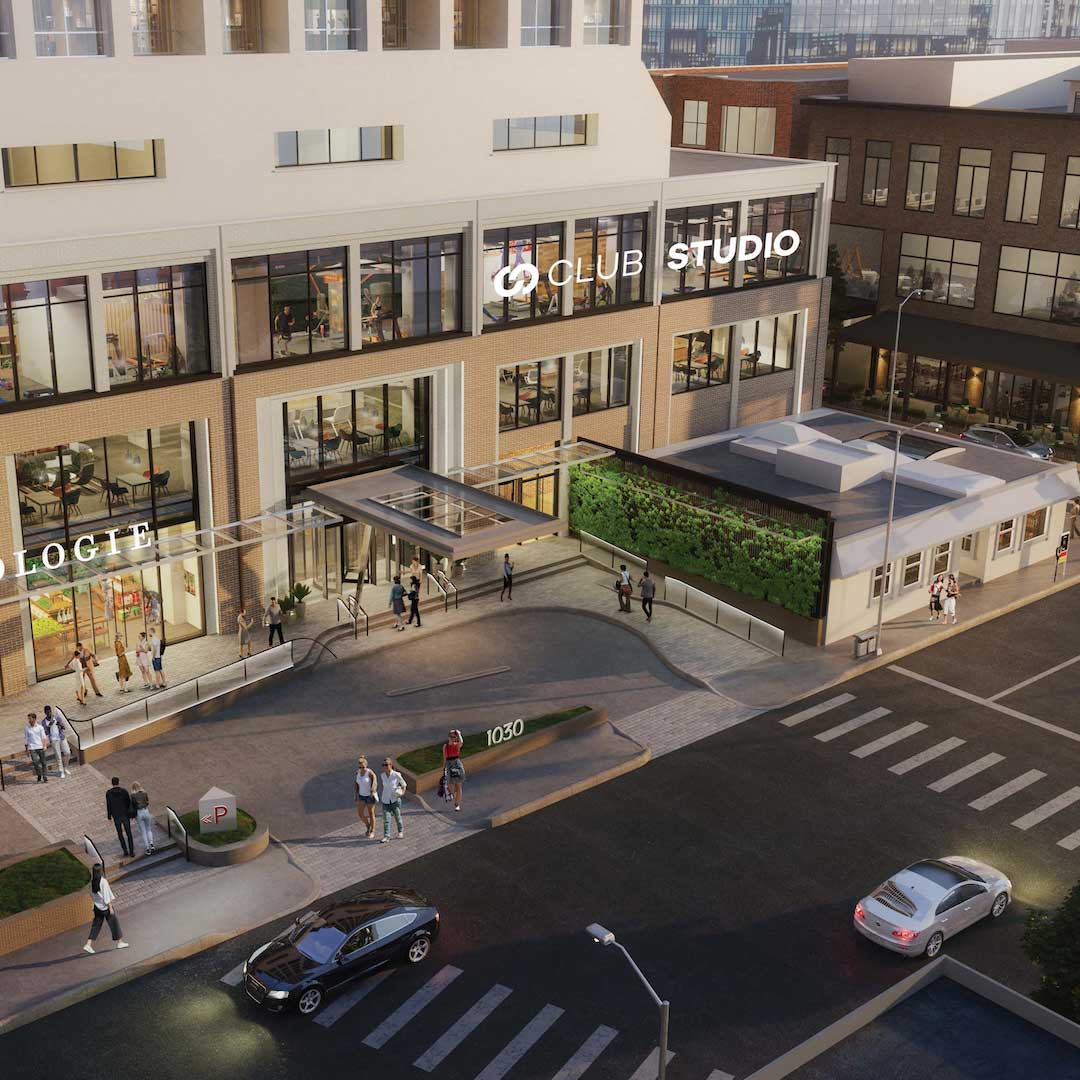 Modern commercial building with street-level shops, Club Studio signage, pedestrian activity, and urban streetscape at The Newberry development.