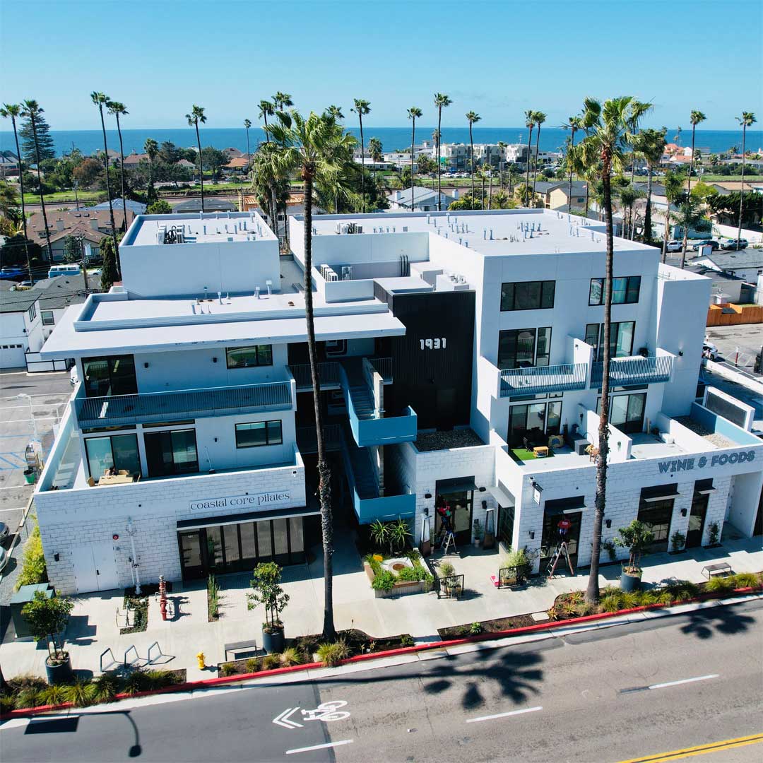 The Flats, an 18-unit multifamily community with two ground-floor retail spaces