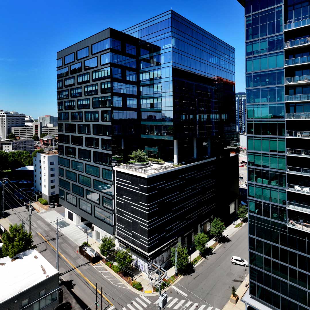 Aerial view of The Moore Building, a 16-story trophy office tower at 827 19th Avenue South in Nashville's Music Row submarket