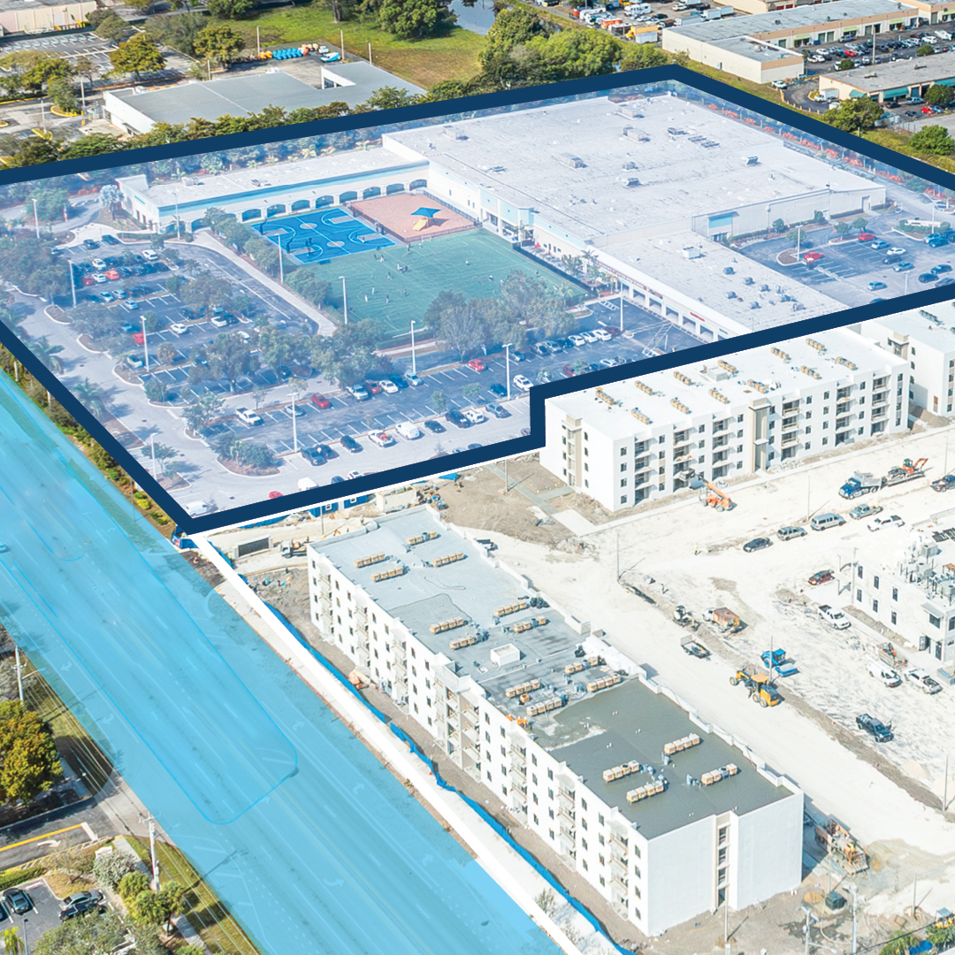 Aerial view of Coconut Creek Plaza with property boundary highlighted, showing the retail center with outdoor sports courts and parking lot adjacent to a newly constructed multifamily residential development under construction