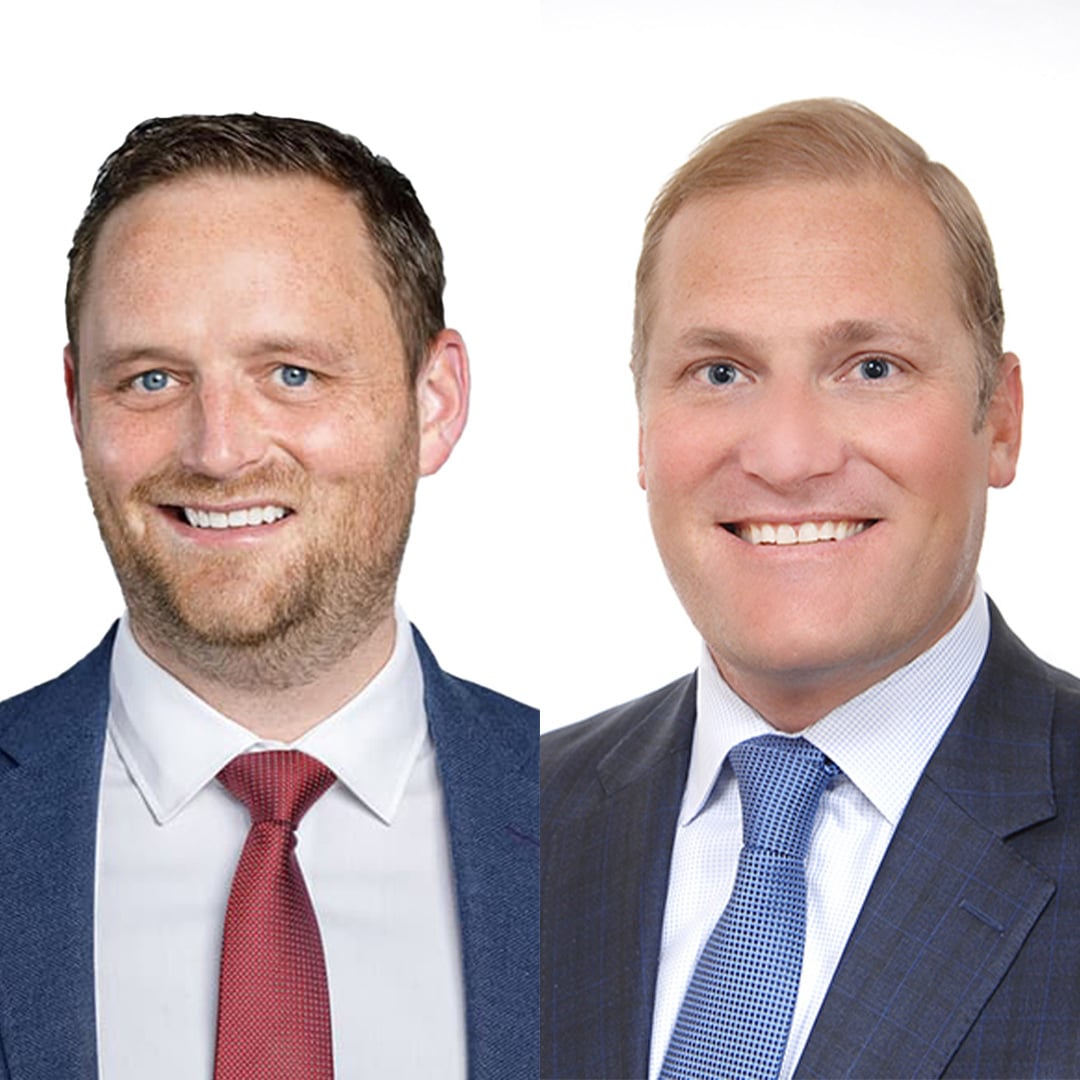 Studio headshots of two commercial real estate capital markets co-heads representing Bay Area leadership.