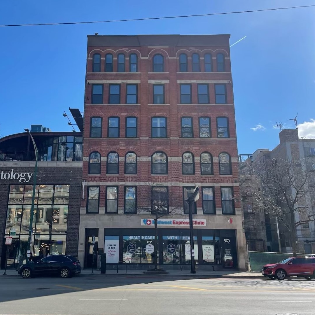 Exterior daytime view from across the street looking at 219 W. Chicago Avenue